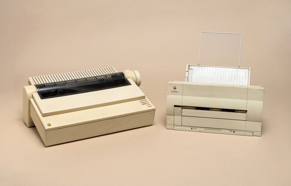 Pavia, Lombardy, Italy - November 2, 2024: Apple printers ImageWriter II (dot matrix), from 1985, and StyleWriter (inkjet), from 1991 at Ctrl+Alt Museum