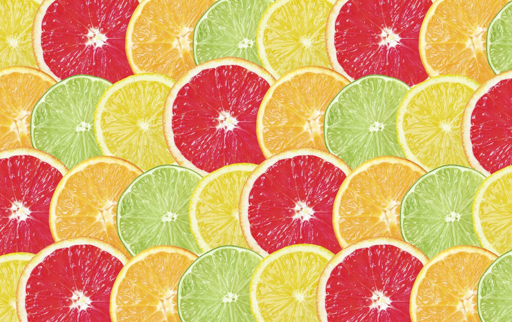 Citrus fruits as background, top view. Slices of orange, grapefruit, lemon and lime