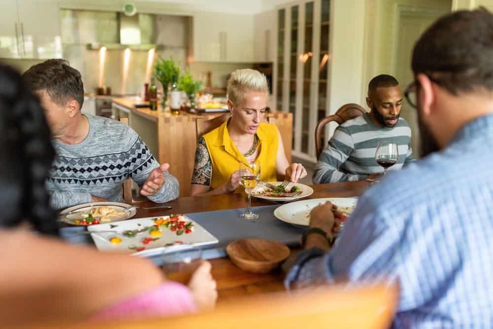 Diverse friends dining together joyfully