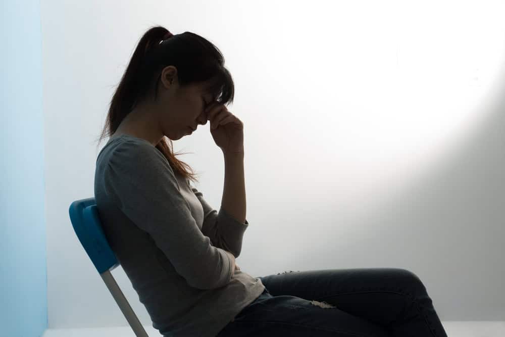 The depression woman sit on the chair