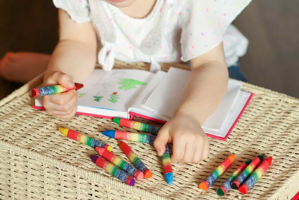 Little girl 6 years old draws with wax crayons in 2024 10 18 08 04 49 utc