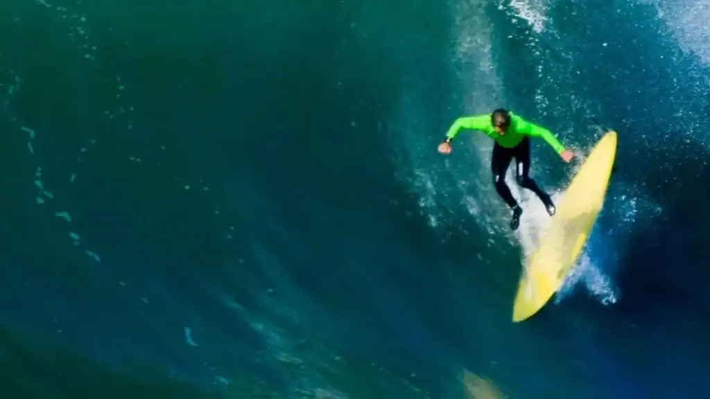 Gun surfboard surfer wiping out