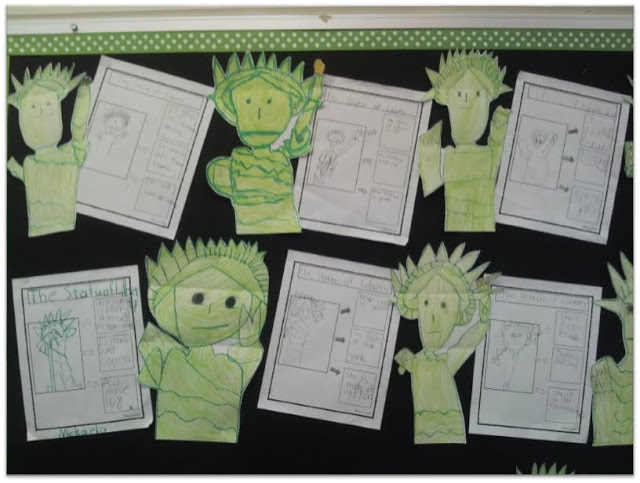Statue of Liberty directed drawing and writing hang on a bulletin board