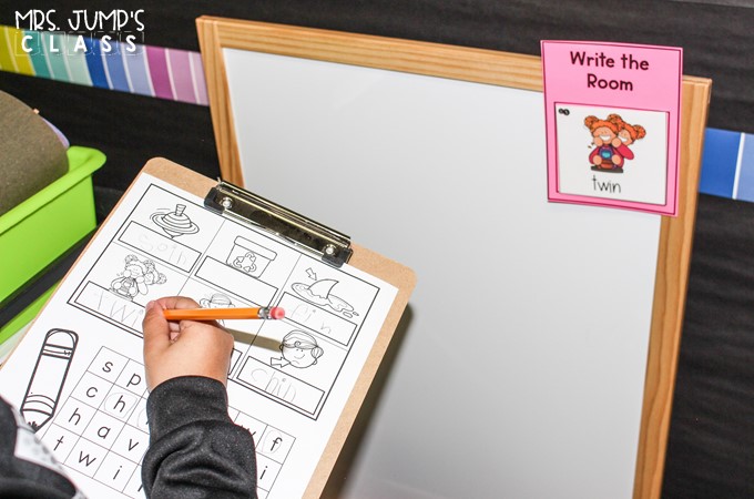 A write the room card is attached to a white board