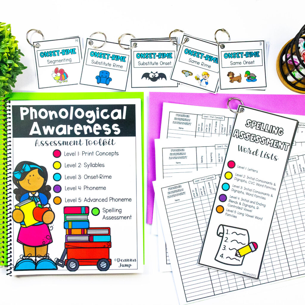 A variety of cards and recording sheets for a phonological awareness assessment