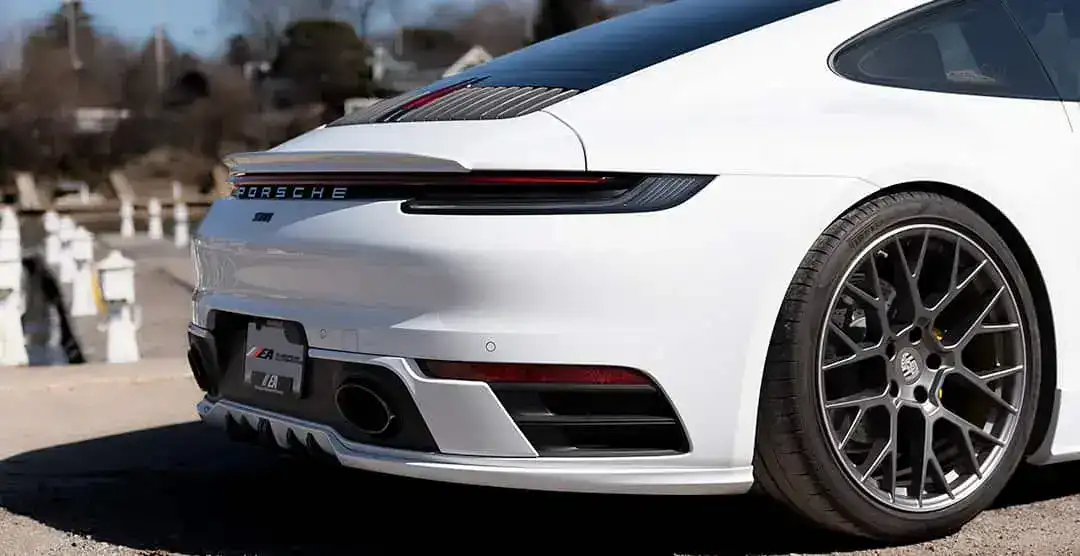 Porsche 992 rear view with H&R Springs and Techart modifications.