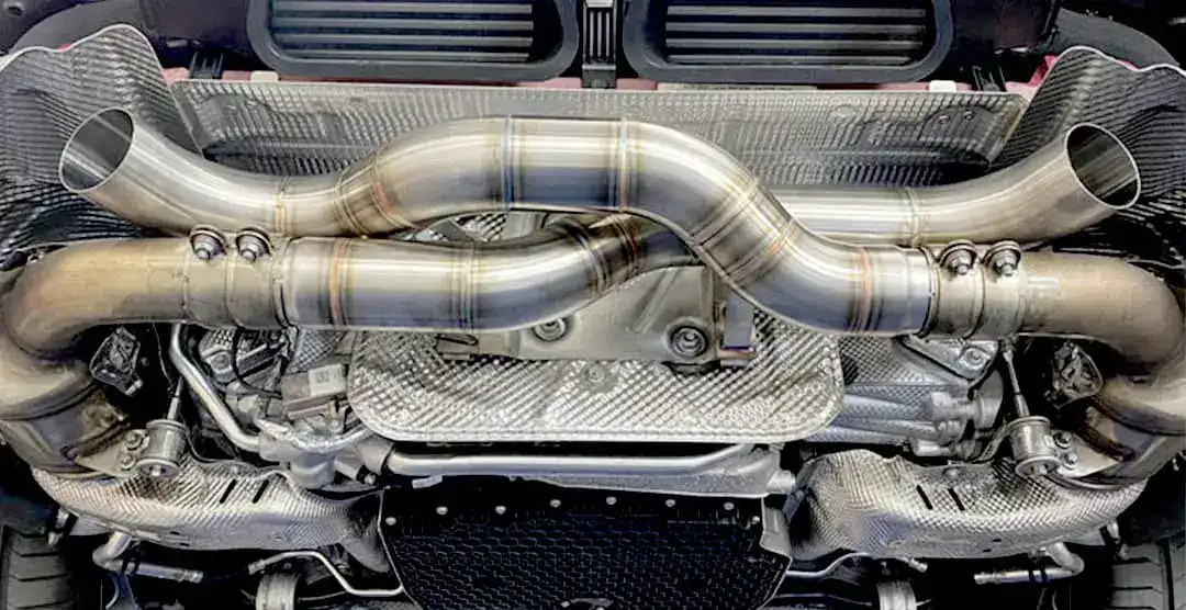 High-performance sport exhaust system for European cars with dual pipes.