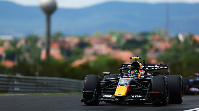 Isack Hadjar driving the Red Bull RB22 on track