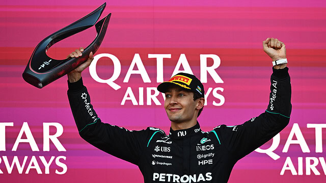 George Russell celebrates on the podium at the Azerbaijan GP 2026