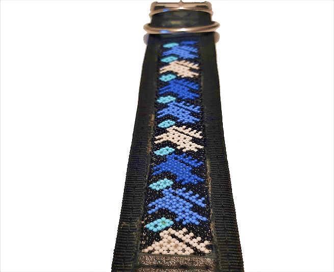 HETS'I LUVI collar with intricate beadwork in blue, black, and white, showcasing traditional craftsmanship and cultural heritage from Mexico.