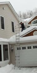 Reuben inspecting ice dams