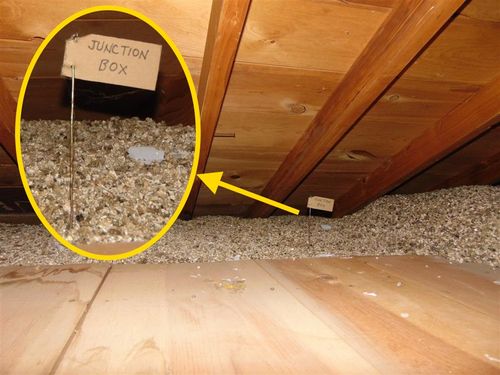 Junction box covered by vermiculite