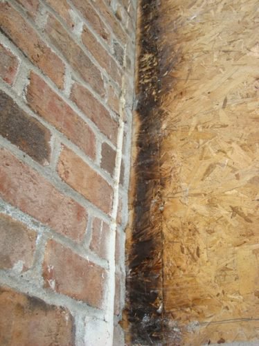 Scorched sheathing next to chimney 2