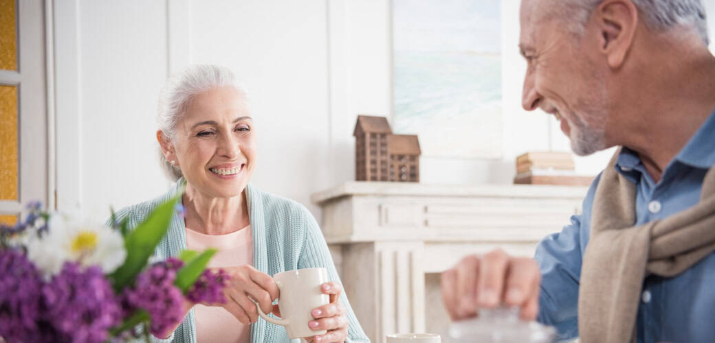 baby boomer couple talking