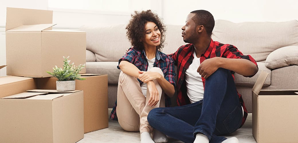 young couple moving-living room