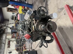 Engine disassembled for restoration at John's Auto Repair.