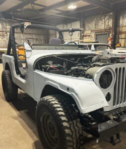 Jeep vehicle undergoing restoration at John's Auto Restorations.