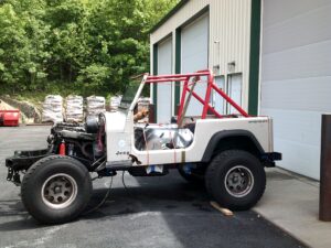 Jeep vehicle undergoing restoration at John's Auto Restorations.