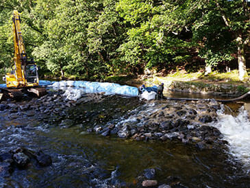 New rock ramp fish pass installed alongside a weir refurbishment