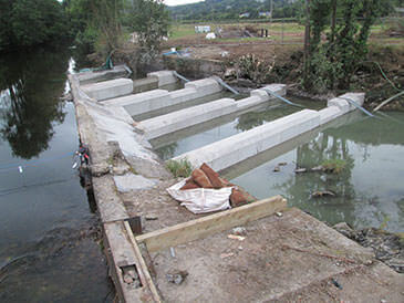 Partially completed pool and weir fish pass