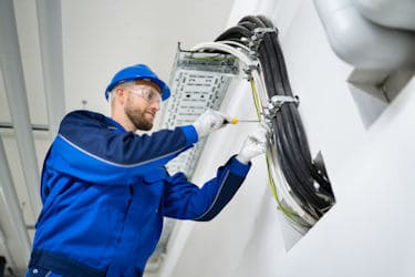 commercial solar power installation -Solar PV DC cabling being installed