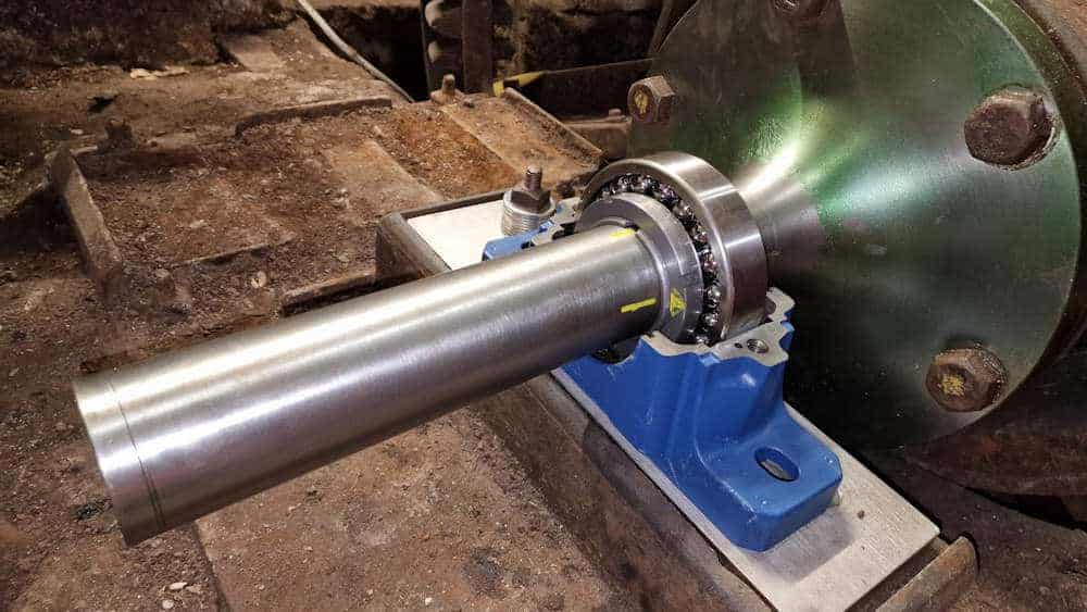 drive-end rolling-element bearing being assembled, greased and capped.