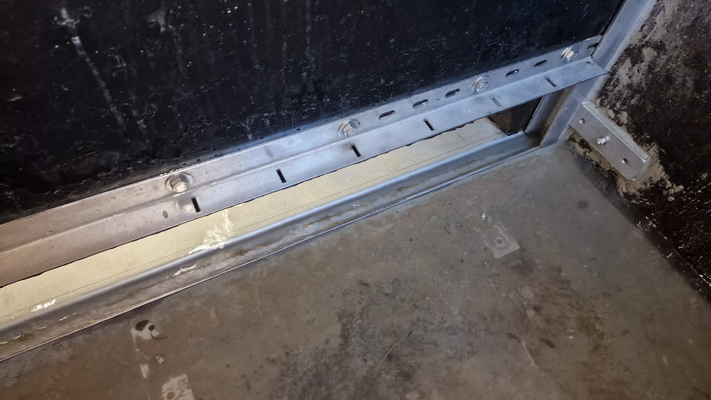 The new launder sluice gate with stiffening brace to prevent it vibrating in operation