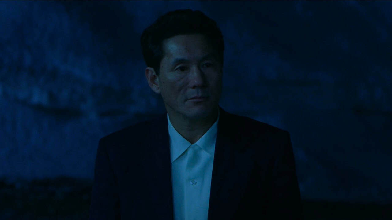 Takeshi Kitano in HANA-BI at night, with no sunglasses on