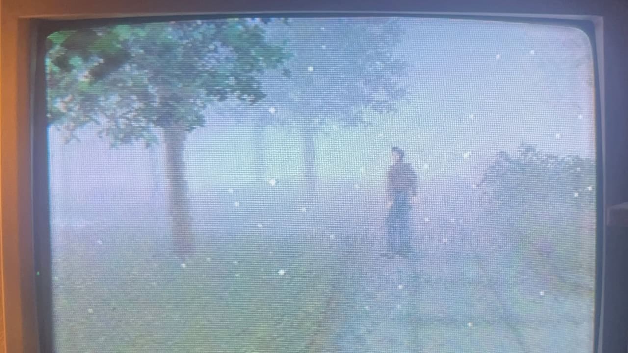An image of Harry Mason in Silent Hill 1 on a CRT