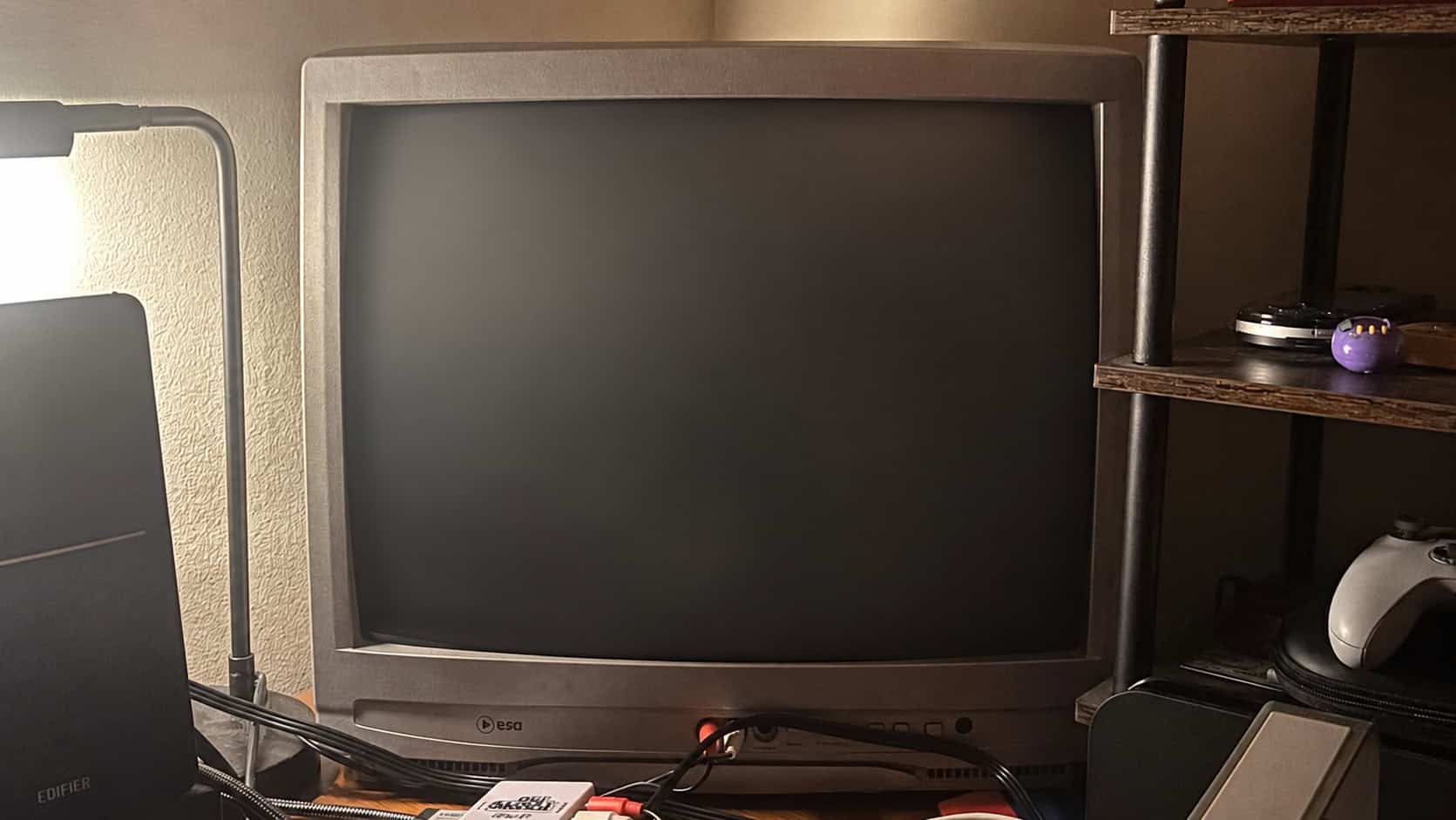 An image of a CRT TV on a desk