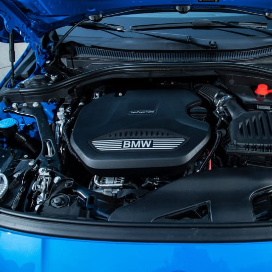 Close-up of BMW engine in a German makes vehicle at Schimpfs Garage.