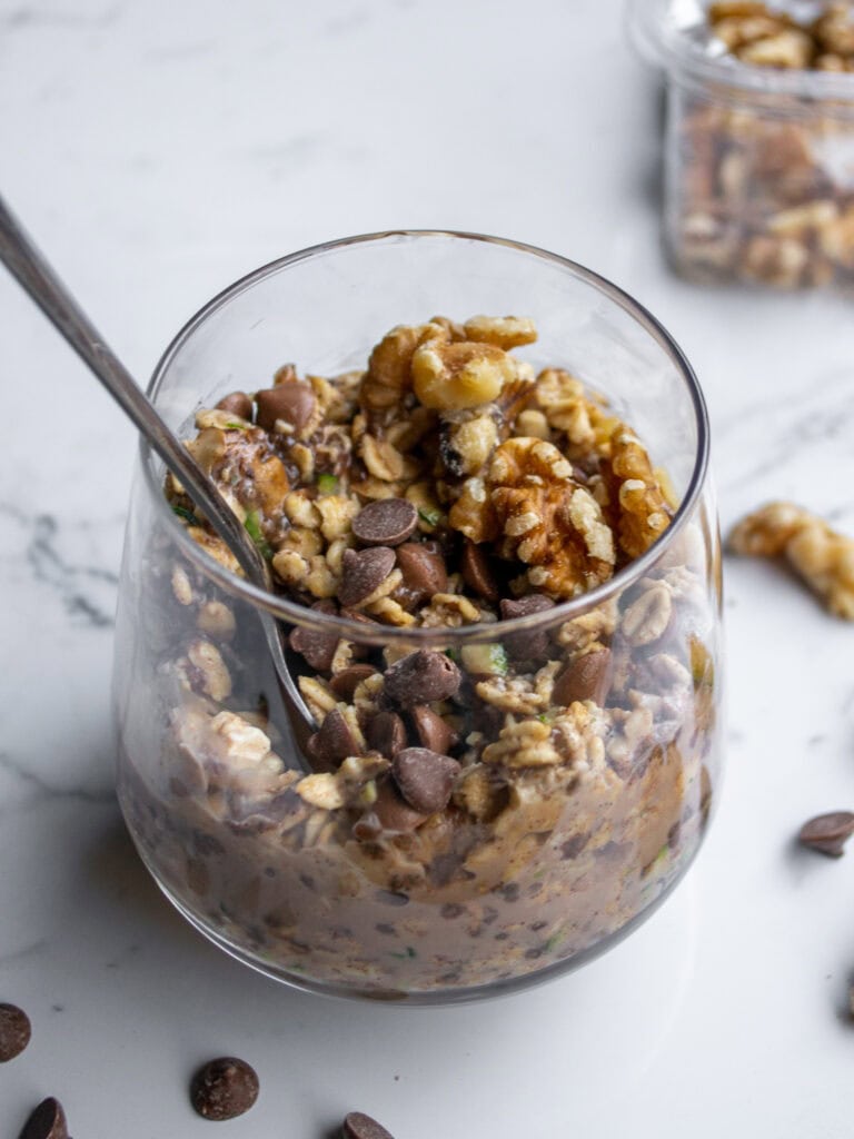 Creamy homemade granola with chocolate chips in a glass jar, perfect for a healthy breakfast or snack. Filled with oats, nuts, and chocolate for a delicious, nutritious treat.