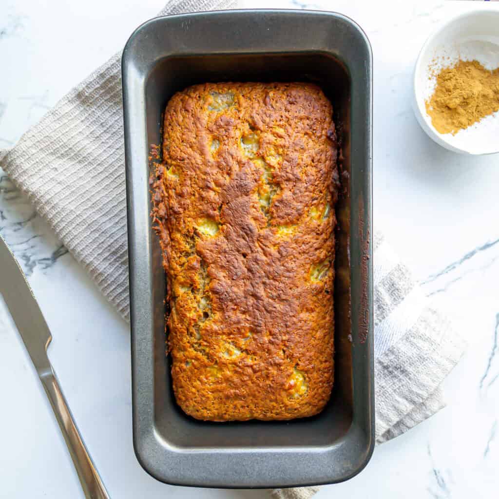 Delicious homemade meatloaf in a baking pan topped with a crispy, golden-brown crust, ready to serve for a comforting family dinner or meal prep.