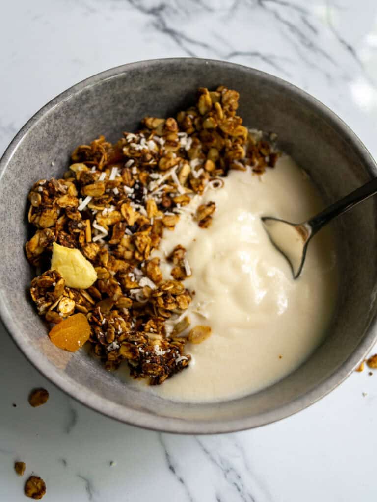 Granola yogurt bowl with fresh fruit and coconut flakes, healthy breakfast, homemade granola parfait, nutritious snack, Simply Fresh Foodie.
