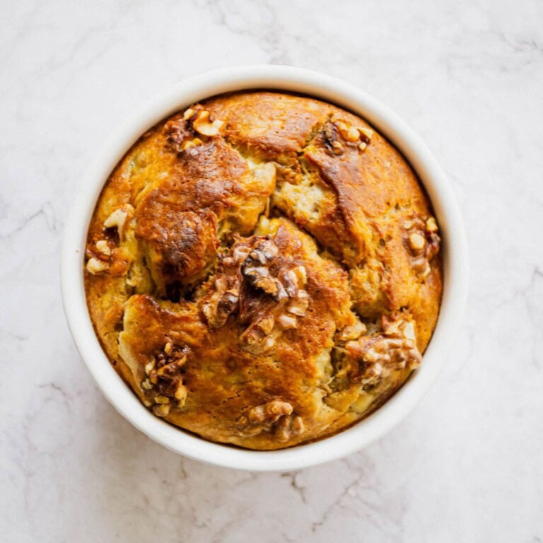Buttermilk Biscuit Bread Pudding with Walnuts, a warm and comforting dessert featuring tender biscuits soaked in custard and topped with toasted walnuts, perfect for fall and holiday gatherings.