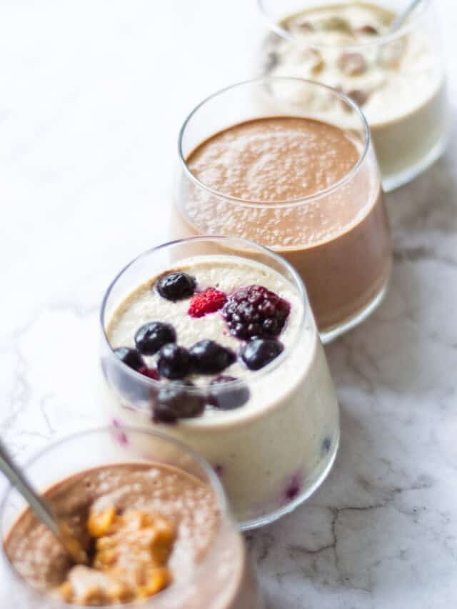 Front view of four flavours of overnight oats in a line.