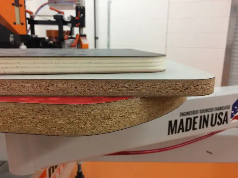 - Thin layered material samples stacked for testing or manufacturing processes.