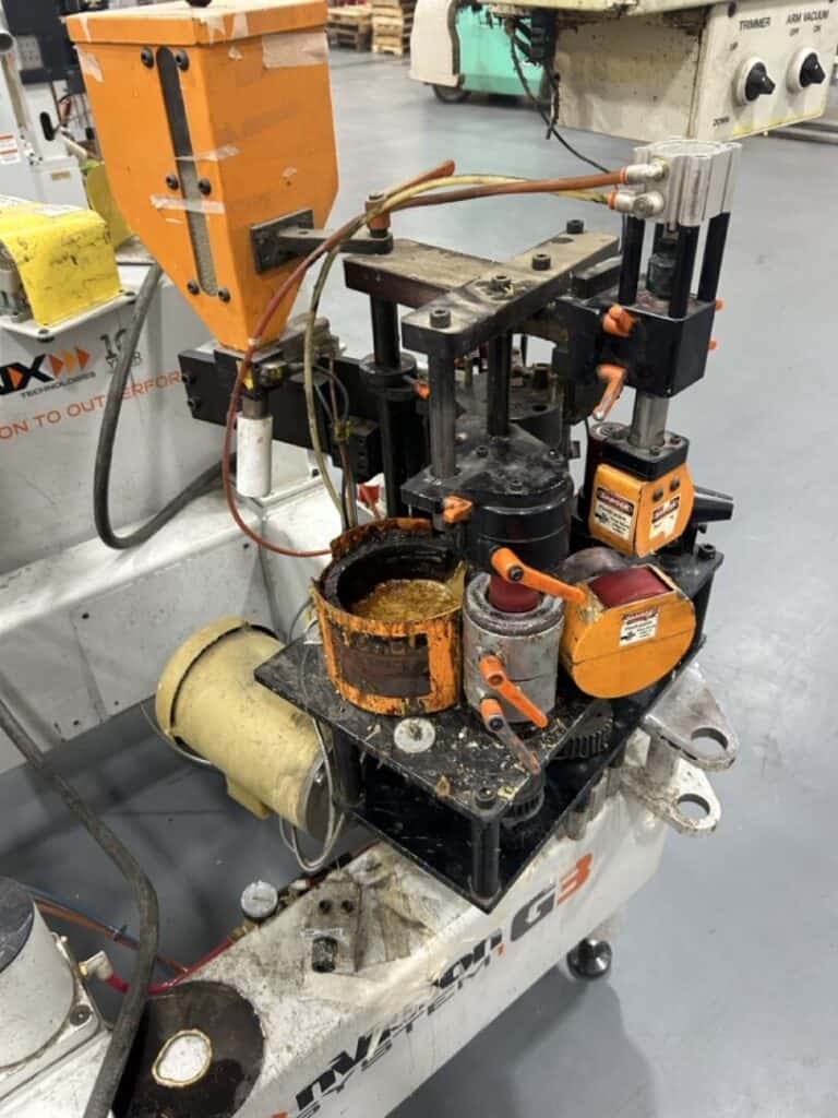 Automotive waxing machine with robotic arm for precision finishing and polishing.