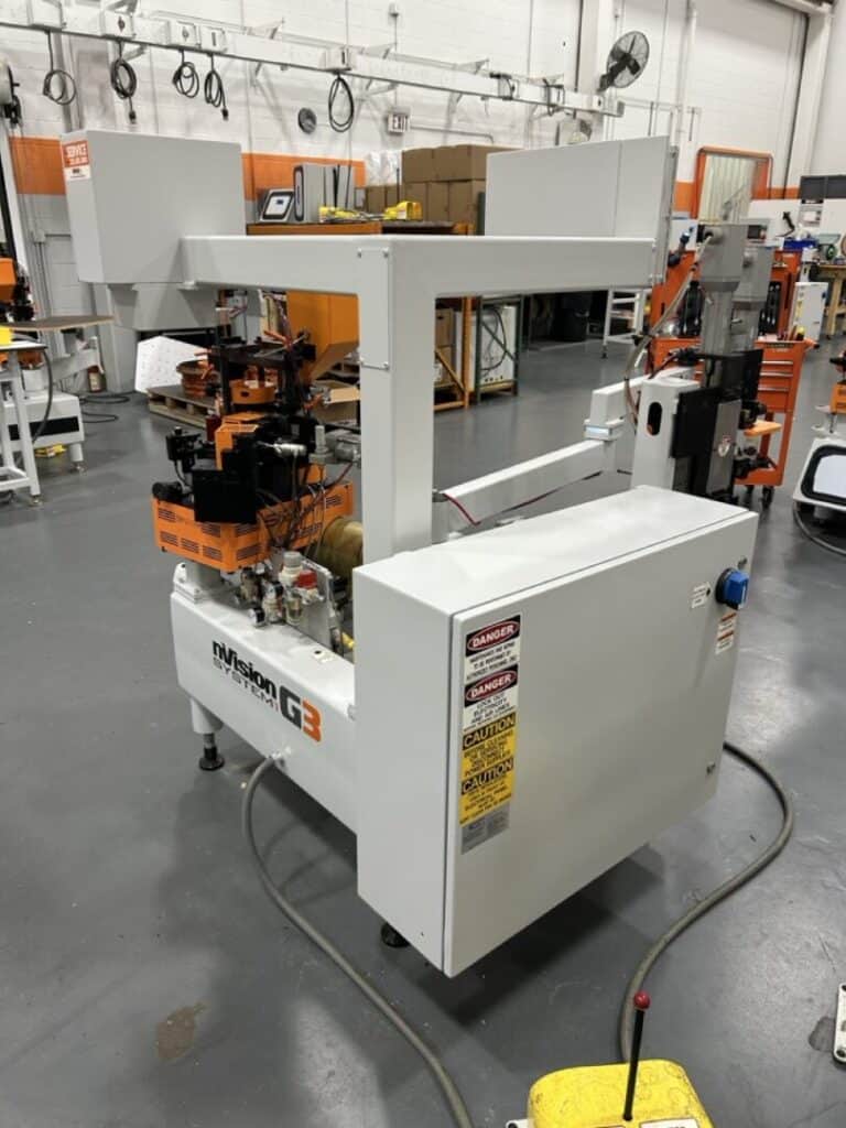 Nissan System G3 industrial automation equipment in a manufacturing facility.