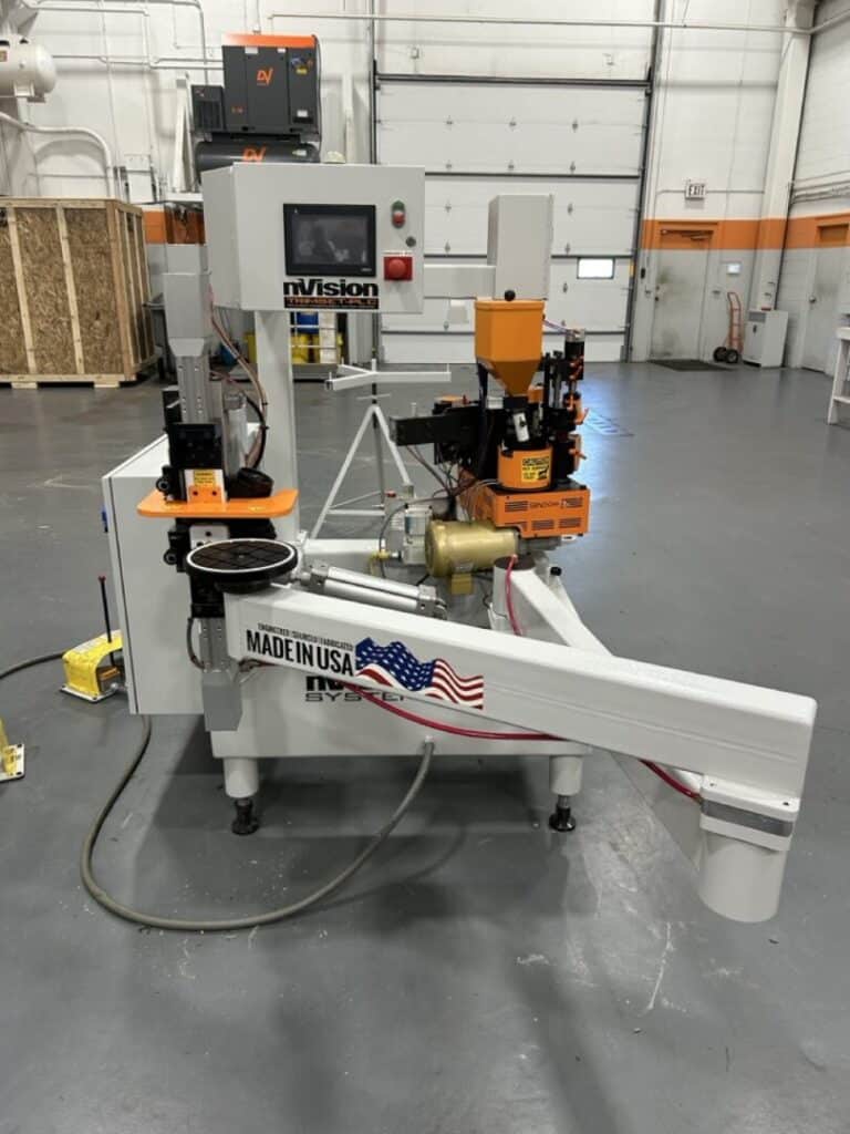 Automatic industrial machinery for manufacturing and automation solutions, made in the USA, by SNX Technologies.