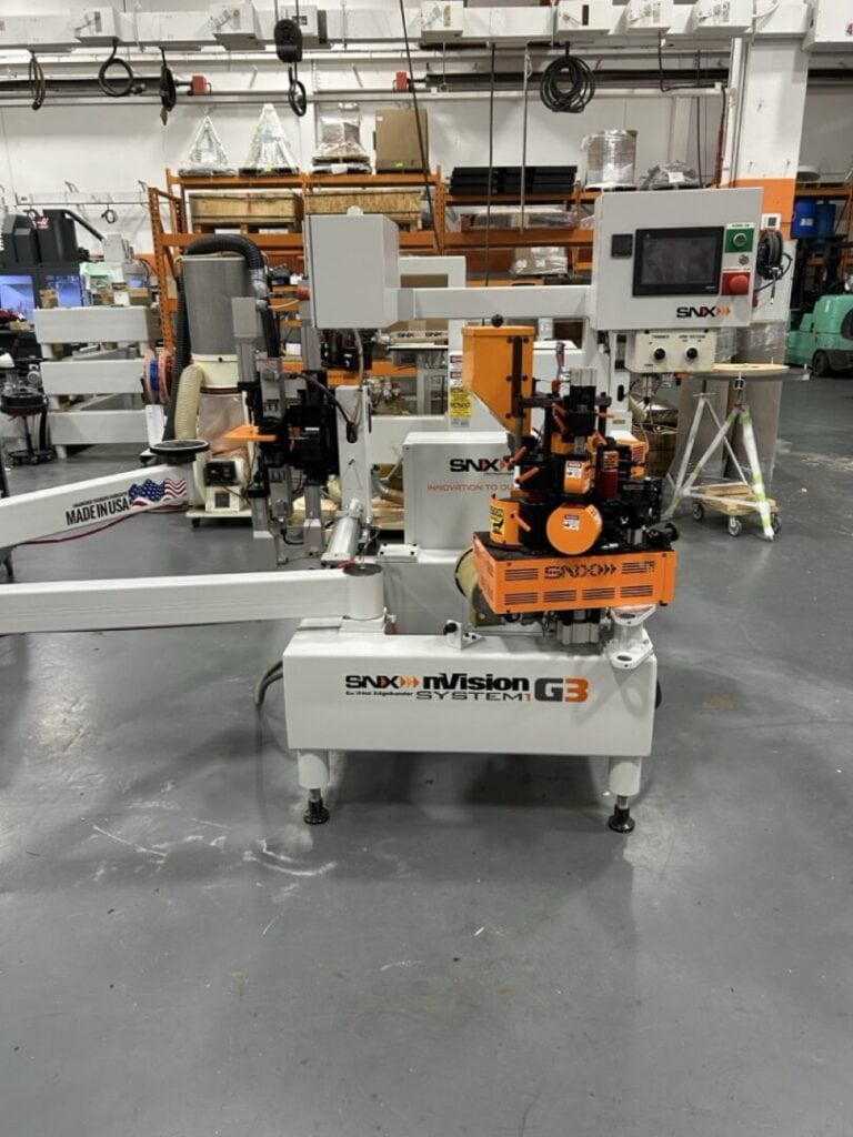 High-precision industrial automation machine manufactured by SNX Technologies.