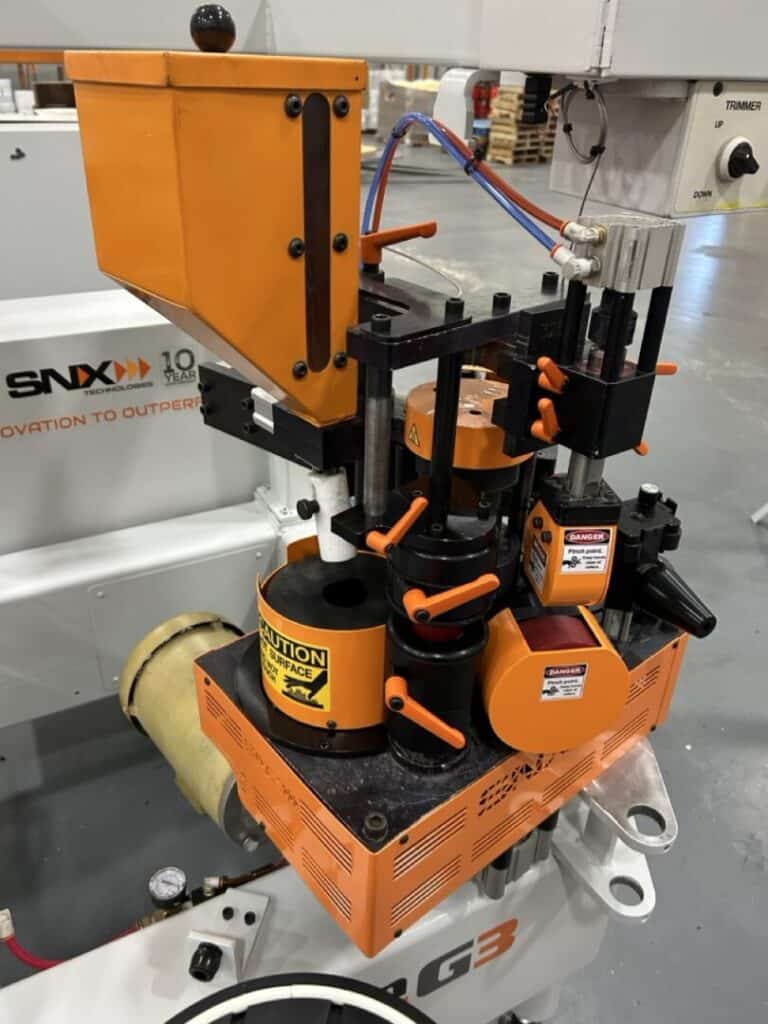 Slot welding robotic arm for industrial automation in manufacturing facilities.