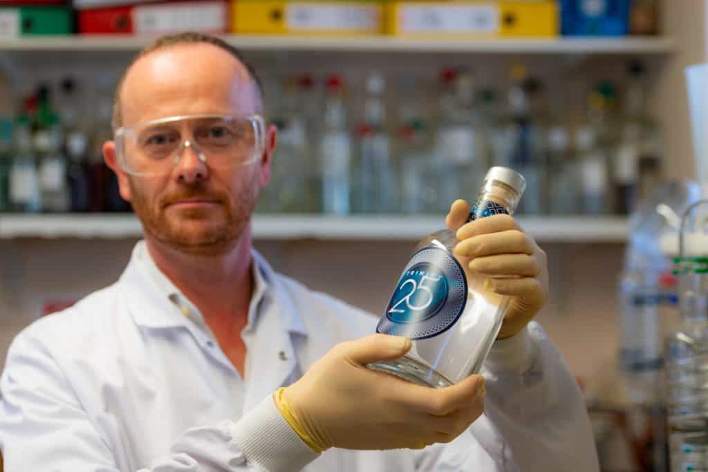Nick Johnson in the lab at the distillery Trinity 25 Spirit of Bermondsey London product photographer