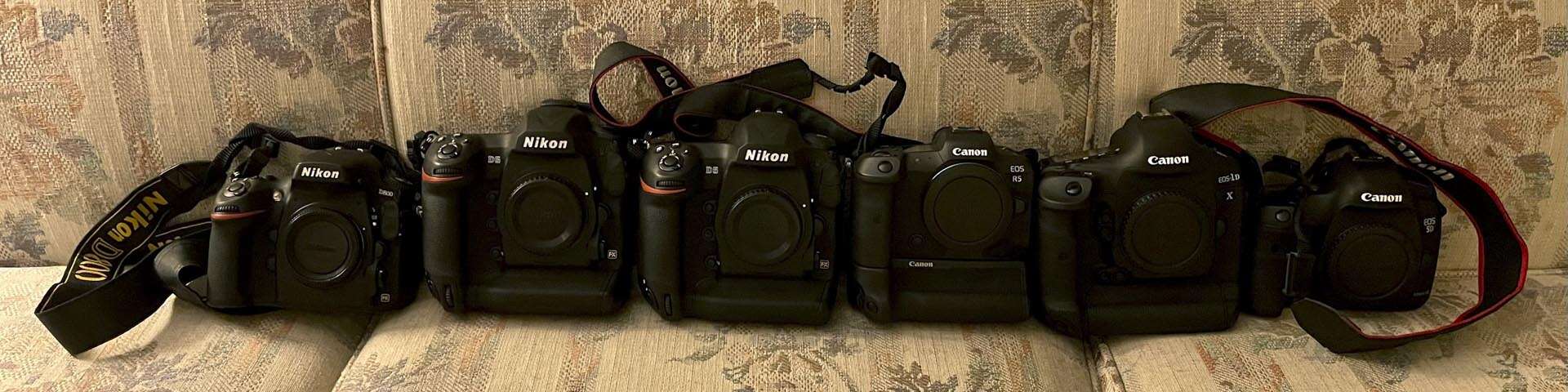 Nikon v Canon side by side on the sofa Dylan vidovich London wedding photographer