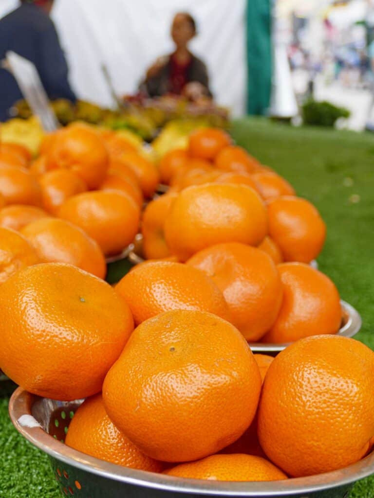 oranges on a bromley market stall taken during a photo lesson Photo class Bromley 230917 161535 a
