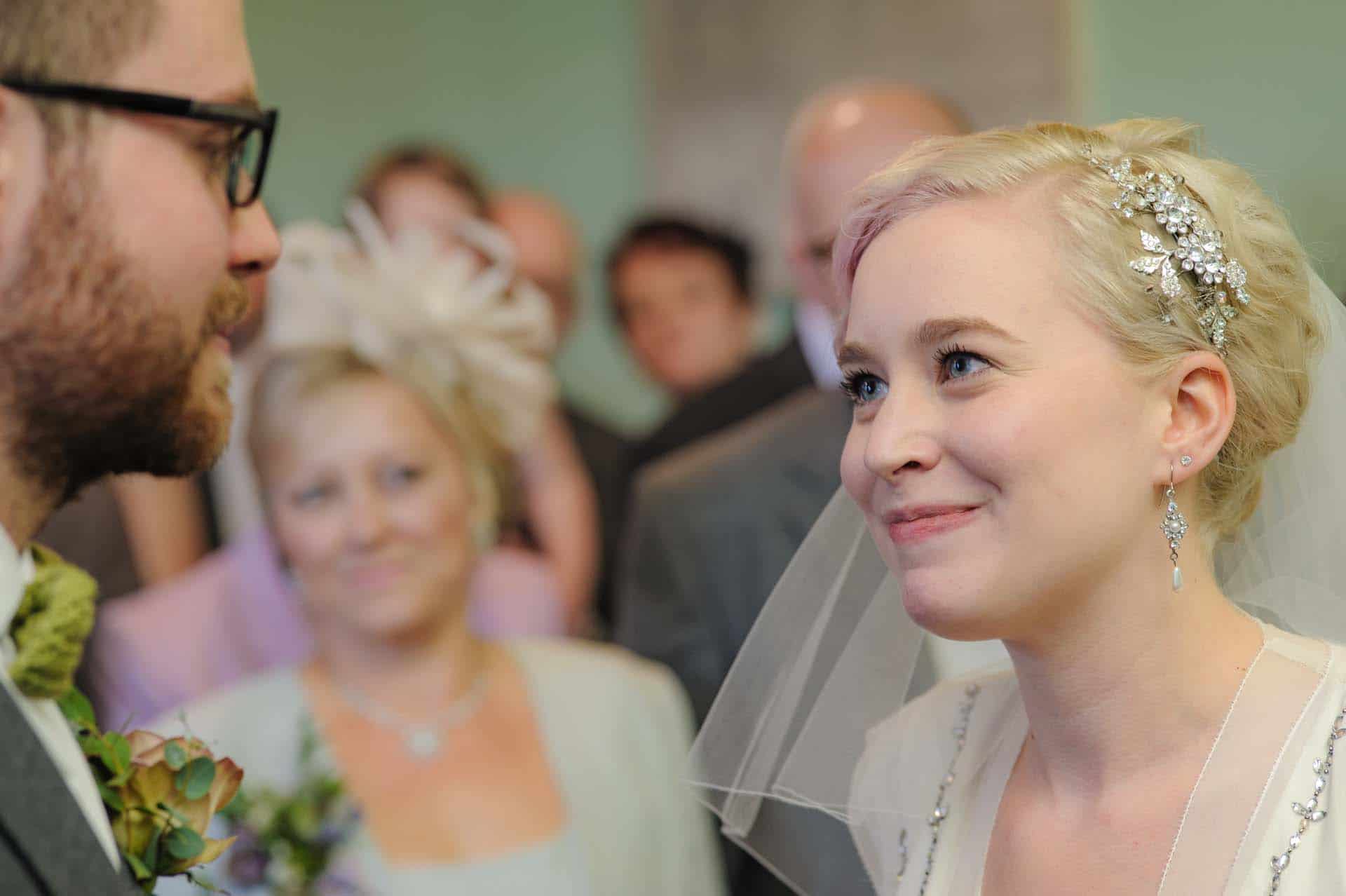 The bride eyes her dear bridegroom's face. sigma 105mm f2.8 macro cuckfield sussex wedding photographer Dave Beth Wed12-09-15 13-57-33 a
