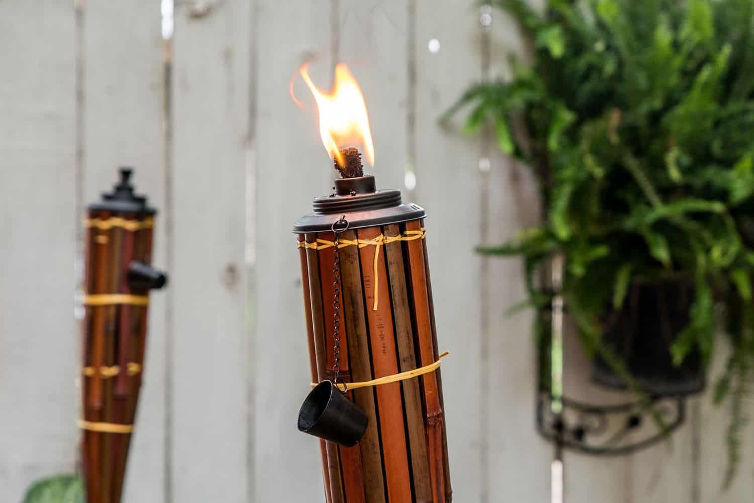 how-to-use-tiki-torches-1391732-03-c6408138962a40d7bbd54ed52d5d7b0c
