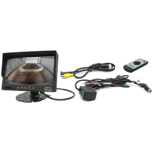 Backup camera system with monitor and remote for vehicle safety.