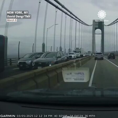 Dashcam video captured the moment high winds flipped a board onto a car's windshield on the Verrazzano Bridge in NYC
