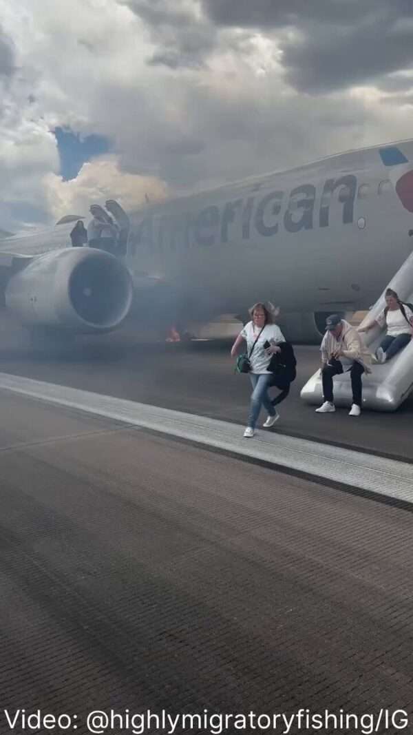 Video: American Airlines Flight AA3023 Evacuated After Main Wheel Fire in Denver 1 American Airlines Flight AA3023